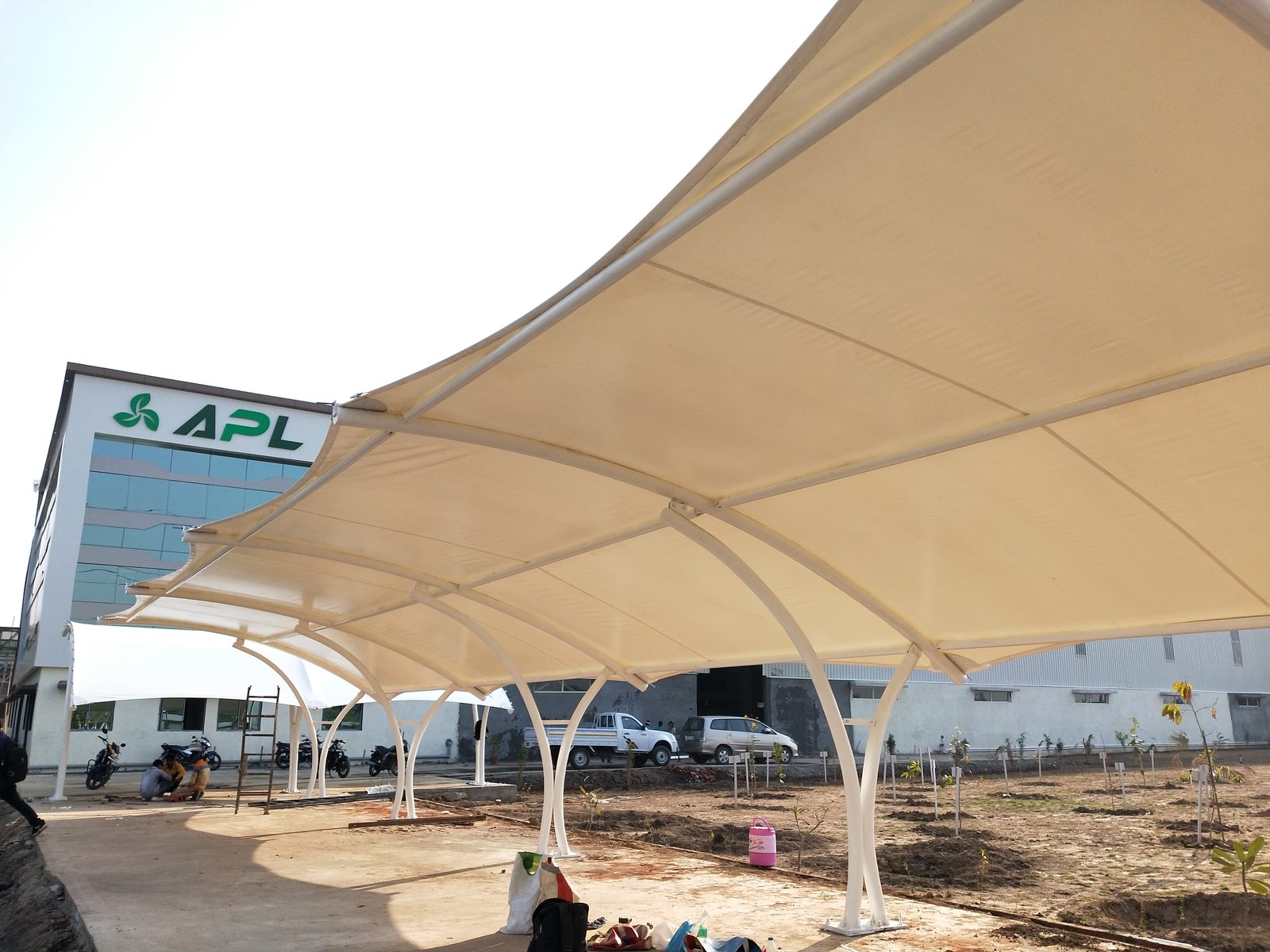 Tensile canopy at an industrial facility