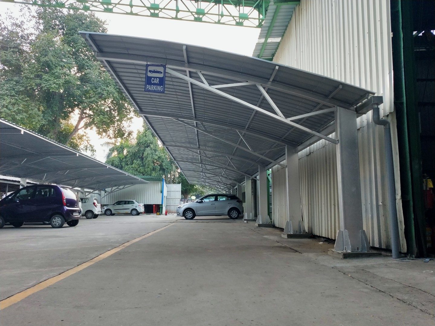 Curved parking canopy