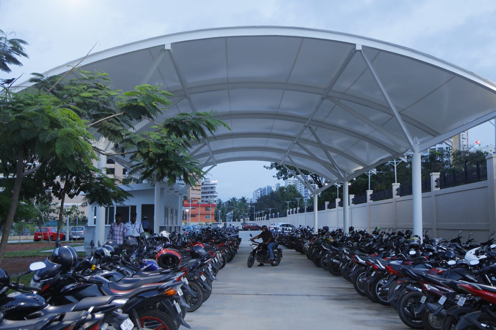 Dome-tunnel covered motorcycle parking