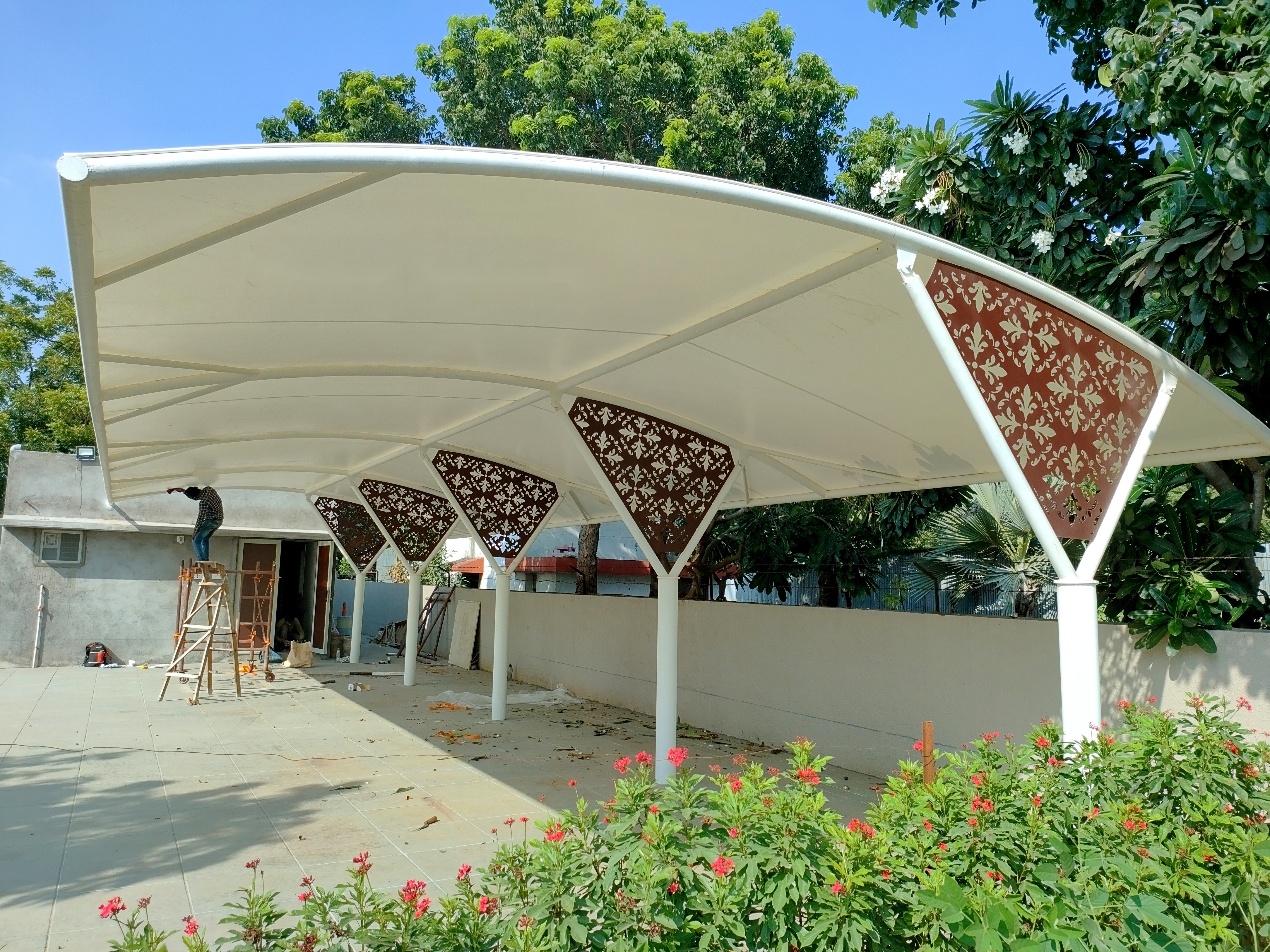 Decorative diamond-panelled cantilever entrance canopy