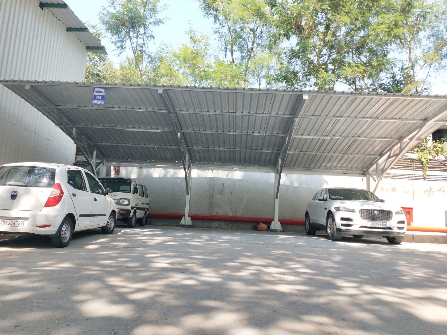 Curved cantilever canopy at an industrial site