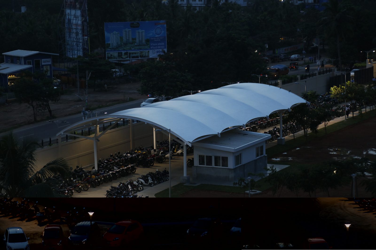 Motorcycle parking canopy at dusk