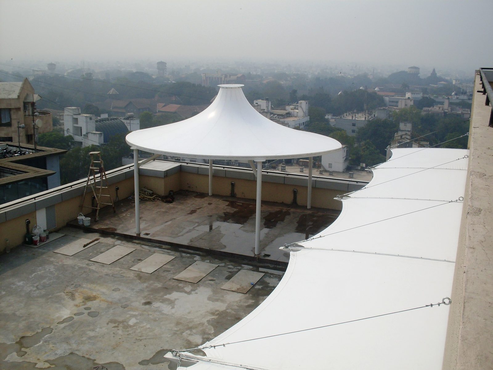Rooftop tensile sail canopy, Aqua Pharm